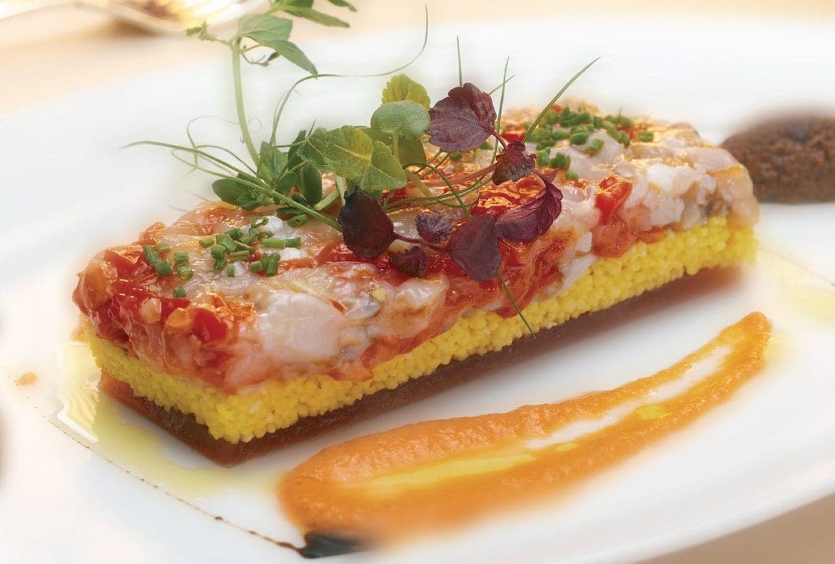 Insalata di fasolari con gelatina di rape rosse, cous cous allo zafferano e purè di olive